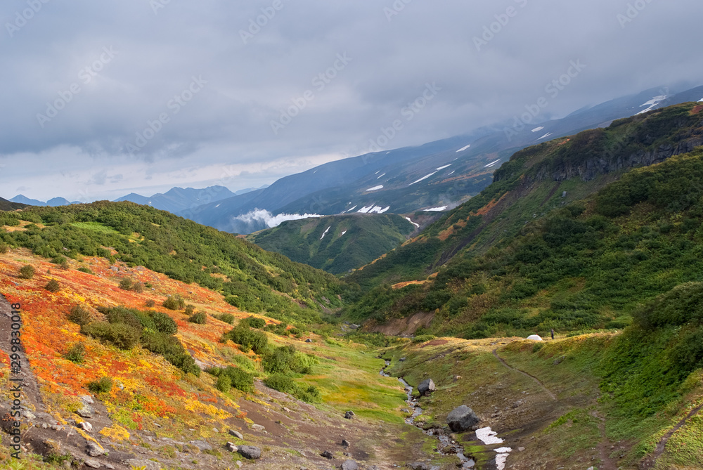 green hilly area, green mountains and mountain river, autumn mountain landscape