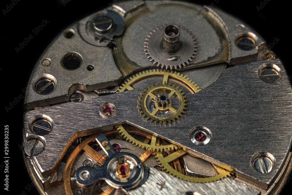 vintage old mechanism with gears and springs, clock mechanism close-up macro
