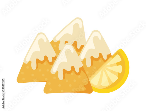 mexican delicious nachos with cheese sauce and lemon