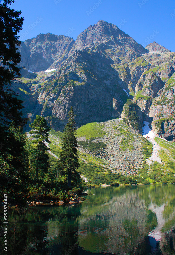 Morskie Oko - the famous lake in the Polish Tatra Mountains, and mount Mieguszowiecki