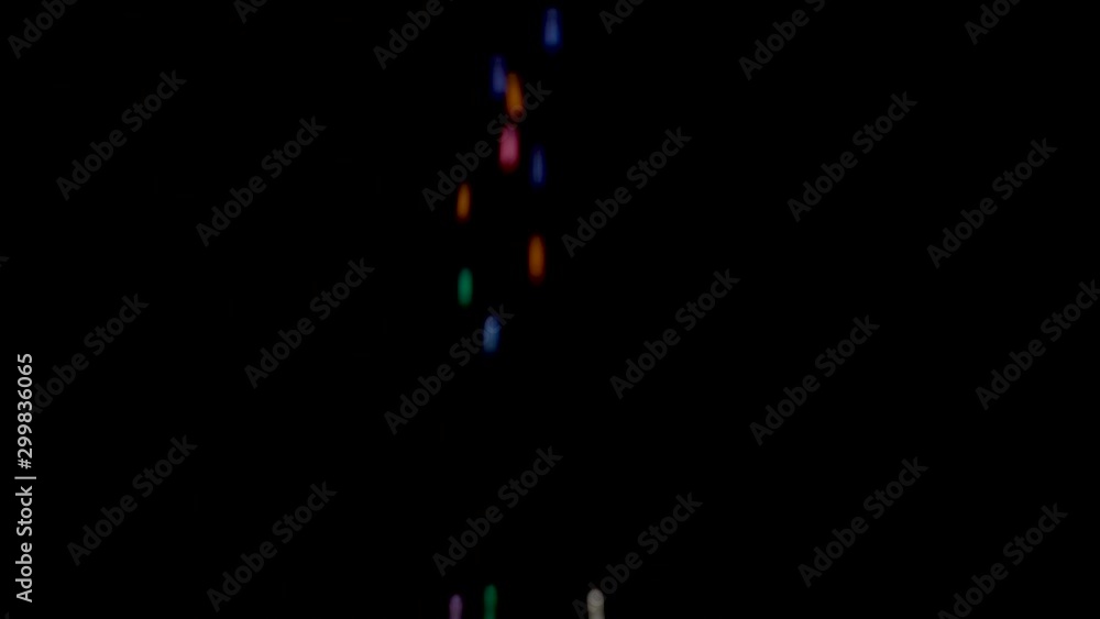 Color paper balls falling on surface Color paper balls falling on surface