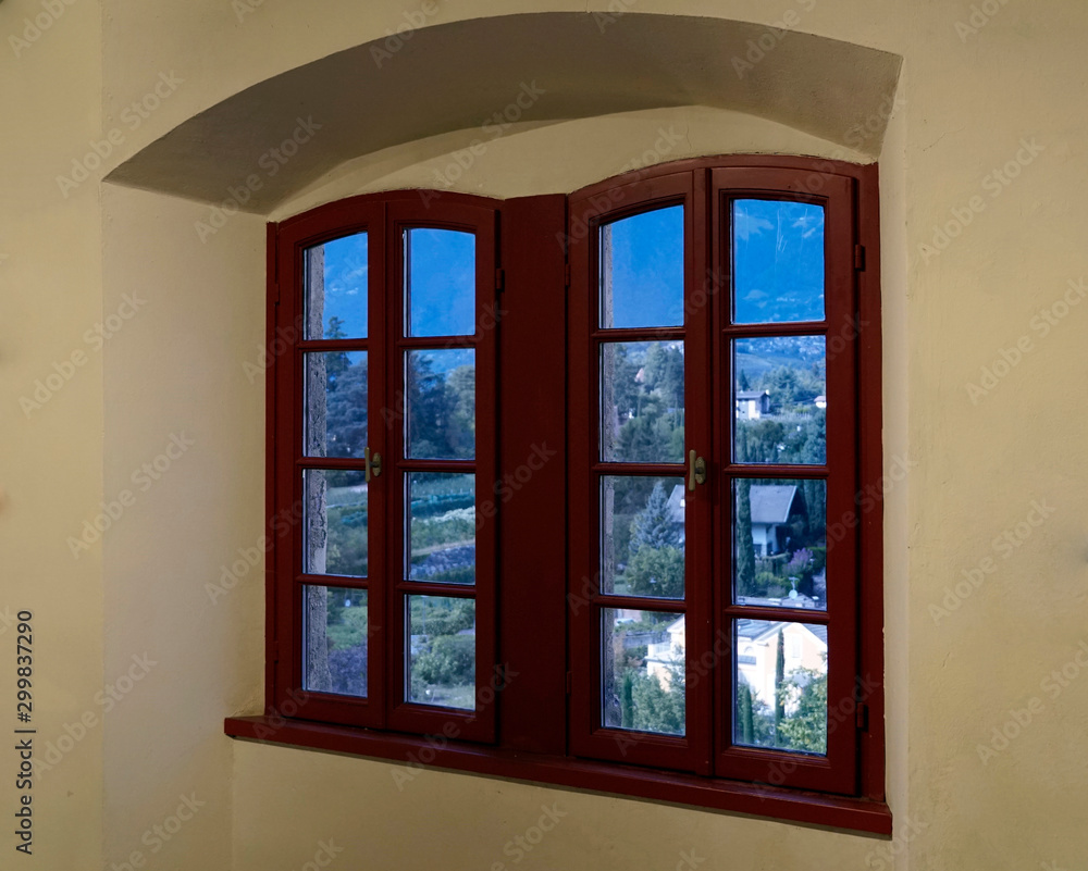 Fototapeta premium View through two antic windows