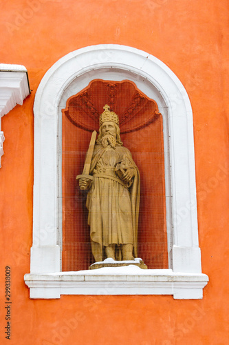 Charlemagne statue next to the entrance to St. Salvator Basilica, the former abbey church of the Pruem Benedictine Abbey at Pruem, Germany photo