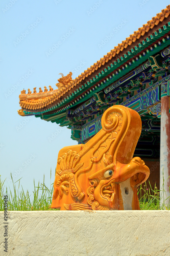 Fototapeta premium yellow glazed tile taps in a temples