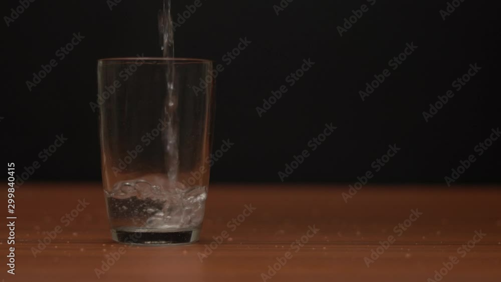 Water poured an a clear glass Water poured an a clear glass
