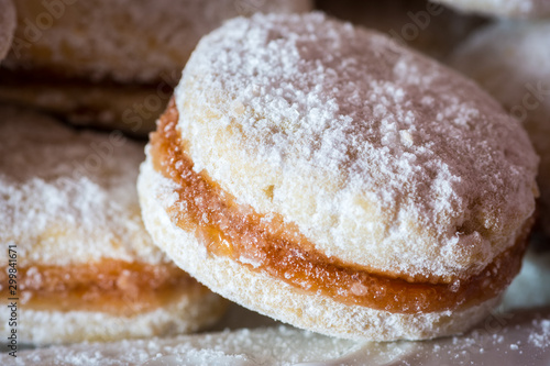 Vanilice (small Vanilla cookies) are bite-sized Serbian Vanilla cookies made as sandwich of two vanilla and walnut cookies held together with a dollop of jam, usually served around the Christmas