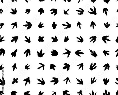 Black trace of dinosaurs on white background, seamless vector wallpaper 