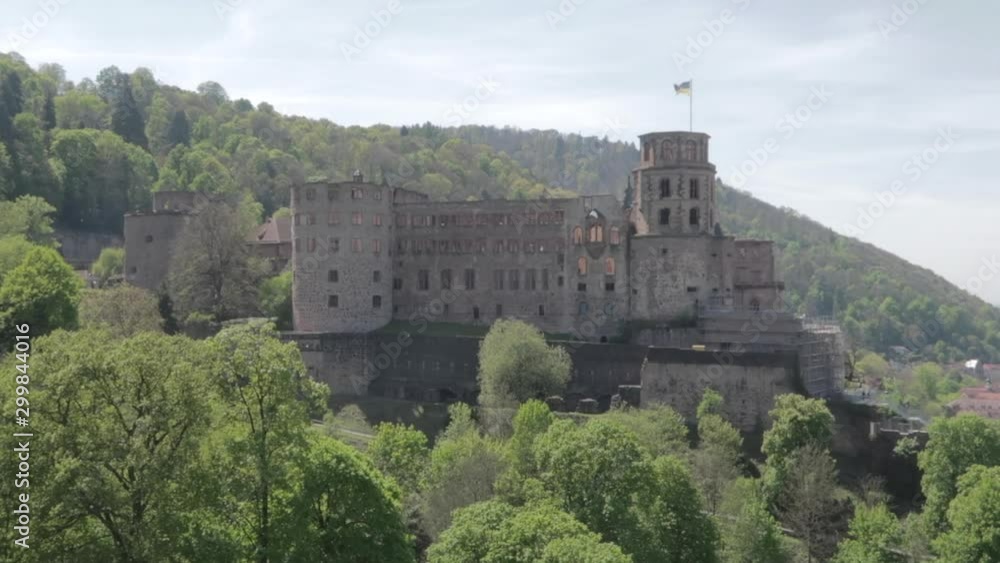 The famous medieval Heidelberg Castle on a hill side on beautiful day. Handheld. The famous medieval Heidelberg Castle on a hill side on beautiful day. Handheld.