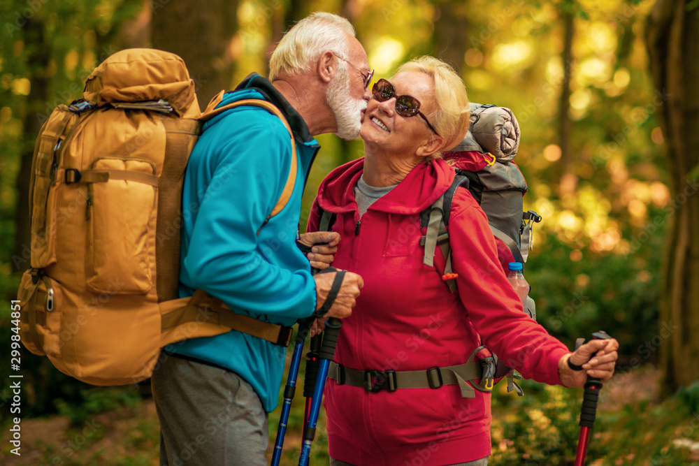 Senior couple walking together in a forest Senior couple walking together in a forest