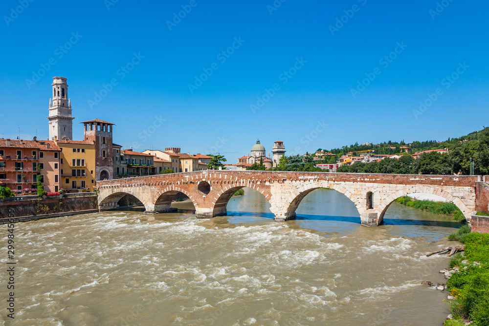 the old roman bridge in Verona  spans the river Etsch