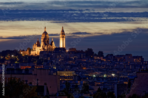Paris, France - October 26, 2019: Sacre coeur basilica at the summit of Montmartre from Bergeyre hill, Paris