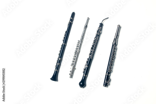 side-blown flute, clarionet, corno Inglese and piccolo flute isolated on white background