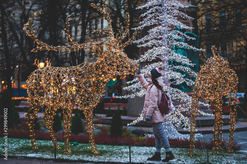 Christmas decorations in the historical center streets of Helsinki, with evening light illumination, concept of Christmas in Finland, with Cathedral, market square, christmas tree photo