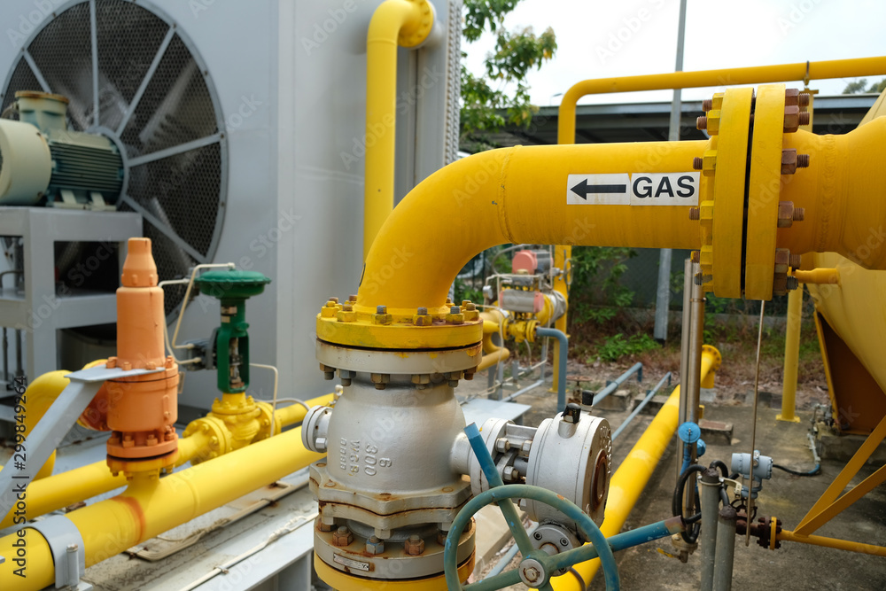 Yellow pipe labelled with the word GAS, process piping Yellow pipe labelled with the word GAS, process piping