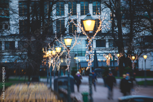 Christmas decorations in the historical center streets of Helsinki, with evening light illumination, concept of Christmas in Finland, with Cathedral, market square, christmas tree photo