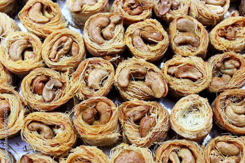 Traditional Middle Eastern dessert baklava with pistachio nuts. A popular pastry made of puff pastry with nuts in syrup...