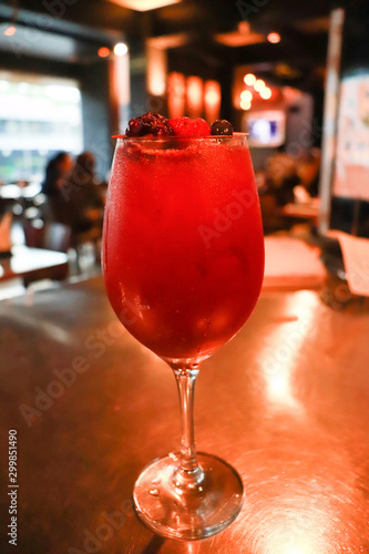 berries cocktail in glass cup photo