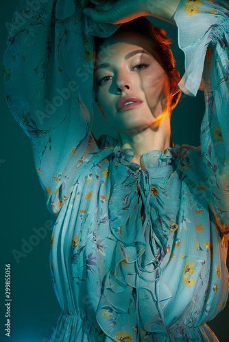 Beautiful lady in blue chiffon dress © Egor Mayer
