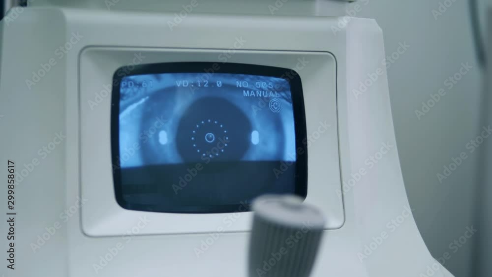 A doctor works with medical machine at a hospital. A doctor works with medical machine at a hospital.