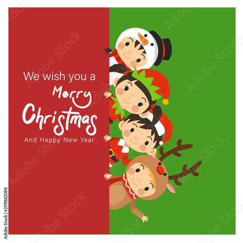 Young kids in Christmas Costume - Snowman,Elf,Santa,Reindeer hiding behind merry Christmas and happy new year sign.