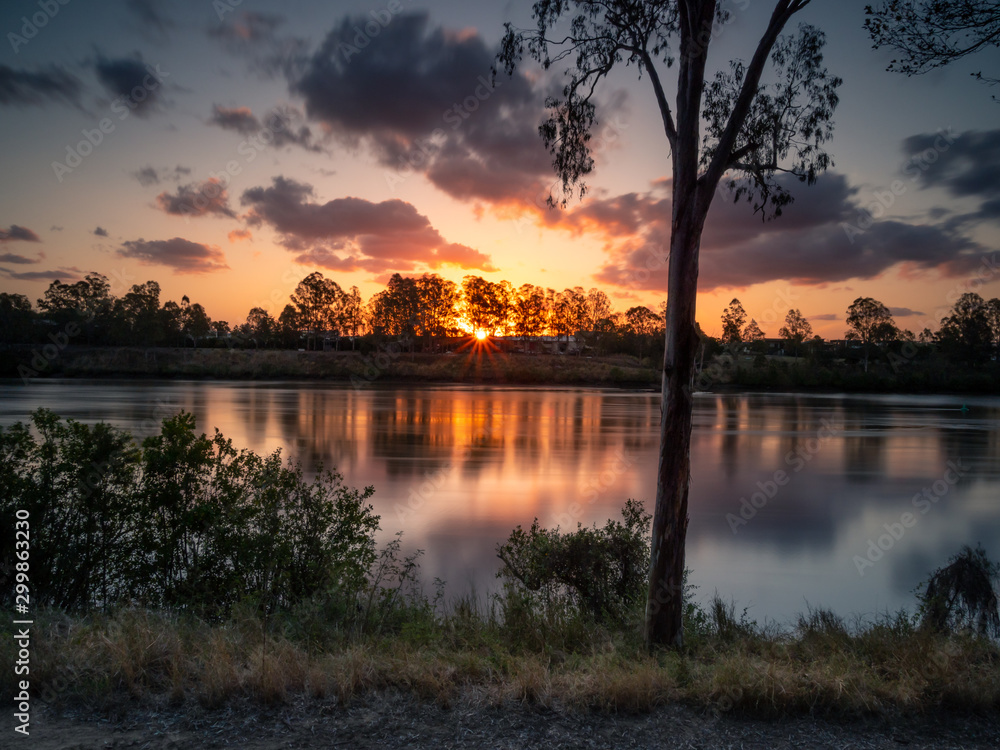 Obraz premium Beautiful River Sunset