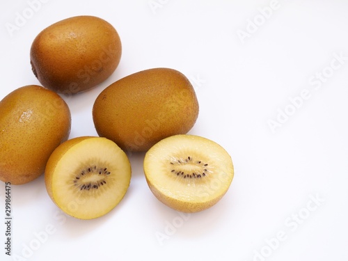 Fresh fruit with gold kiwi isolated on white background.
