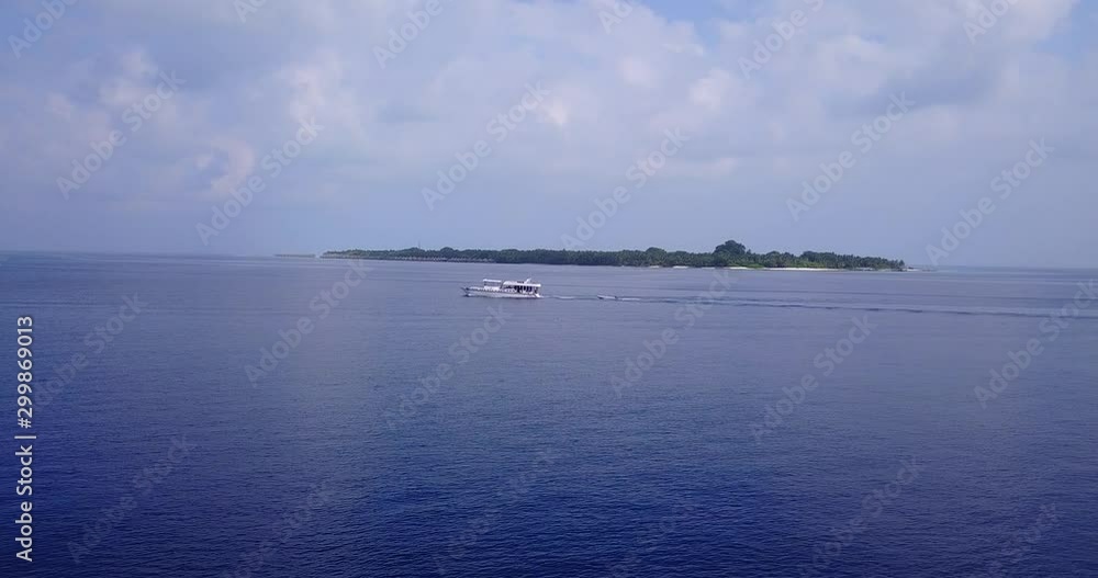 Boat and the small tropical island aerial. Water taxi and luxury vacation concept Boat and the small tropical island aerial. Water taxi and luxury vacation concept