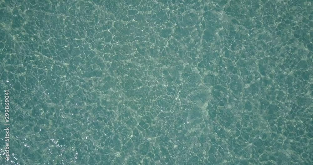 wavy crystal clear turquoise water texture. wavy crystal clear turquoise water texture.