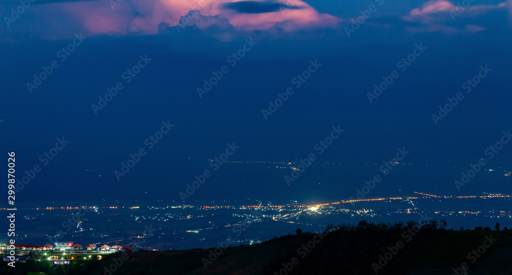 High view beautiful nature landscape of colorful sky during the sunset see the lights of the road and city at Phu Thap Berk viewpoint, Phetchabun Province, Thailand,