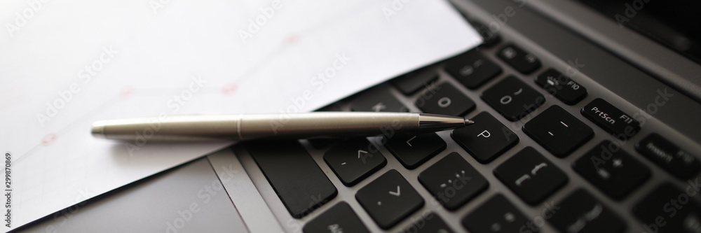 Laptop black keyboard with pen paper Laptop black keyboard with pen paper