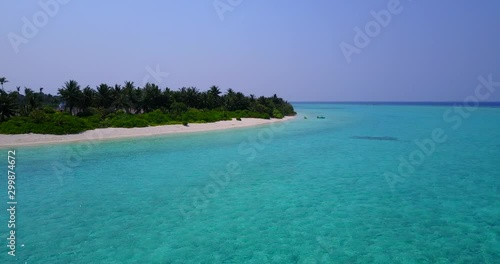 long wide tropical beach, scenic turquoise water and white sand, Tomia Island, Wakatobi marine national park, Indonesia, paradise travel location photo