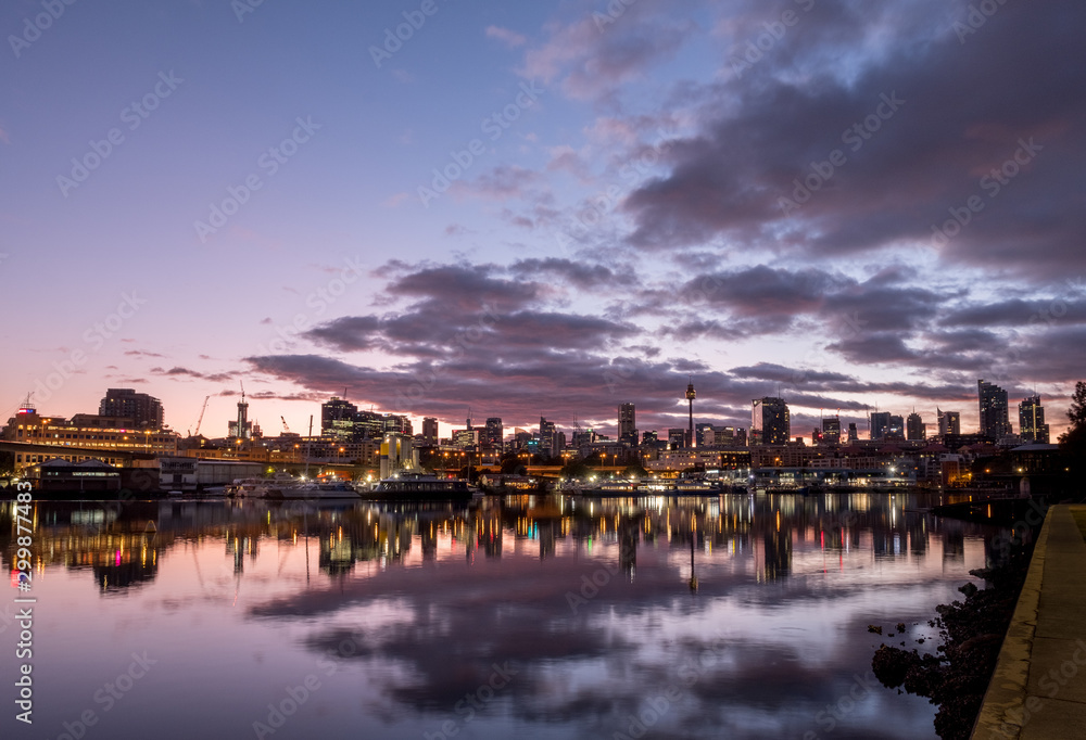 sunrise and close over city skyline sunrise and close over city skyline