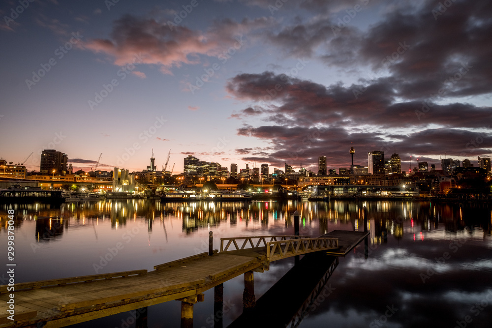 roxers pier and city skyline at sunrise