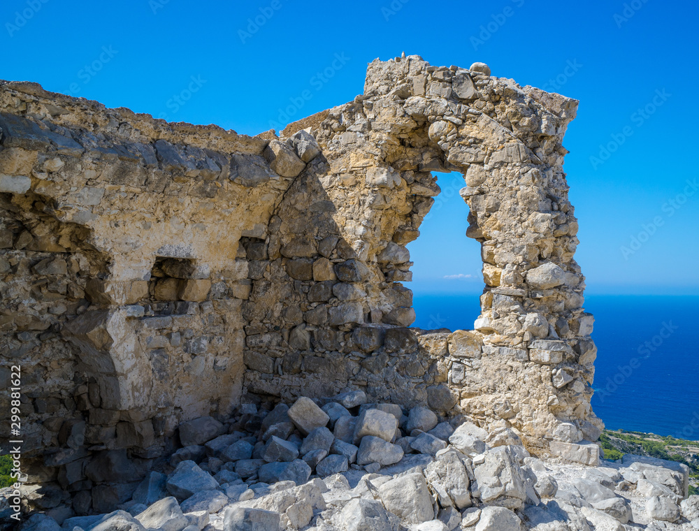 the ruins of the ancient castle in monolithos in south rhodes , Greece.the position was very strategic because of the sea and terra view and the remains can be visited for free every day of the year