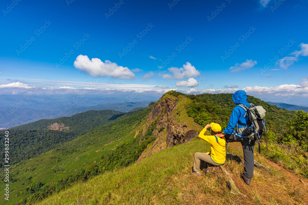Lover backpacking hiking on mountains. Doi Mon Chong, Chiangmai, Thailand.