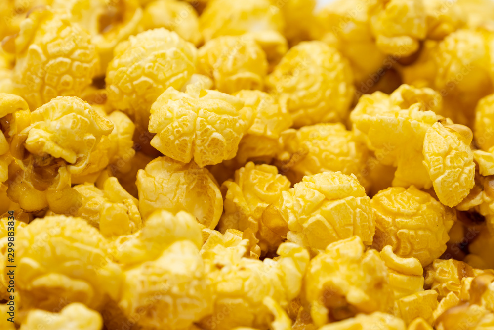 Butter caramel popcorn in wooden bowl bulk on white background, Popular snack with favorite movie Butter caramel popcorn in wooden bowl bulk on white background, Popular snack with favorite movie