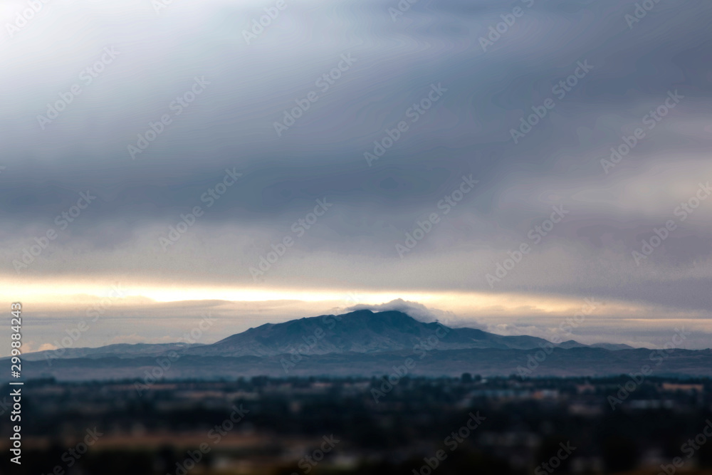 Distant Mountain with Low Clouds