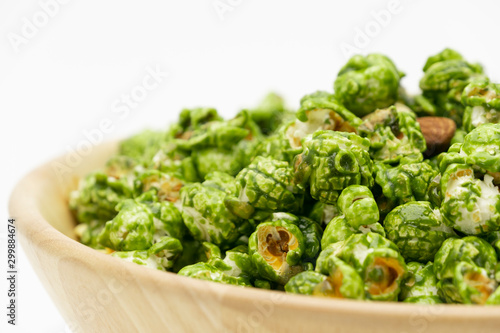 Lush of Japanese matcha green tea popcorn with white background for copy space text, Popular snack with favorite movie