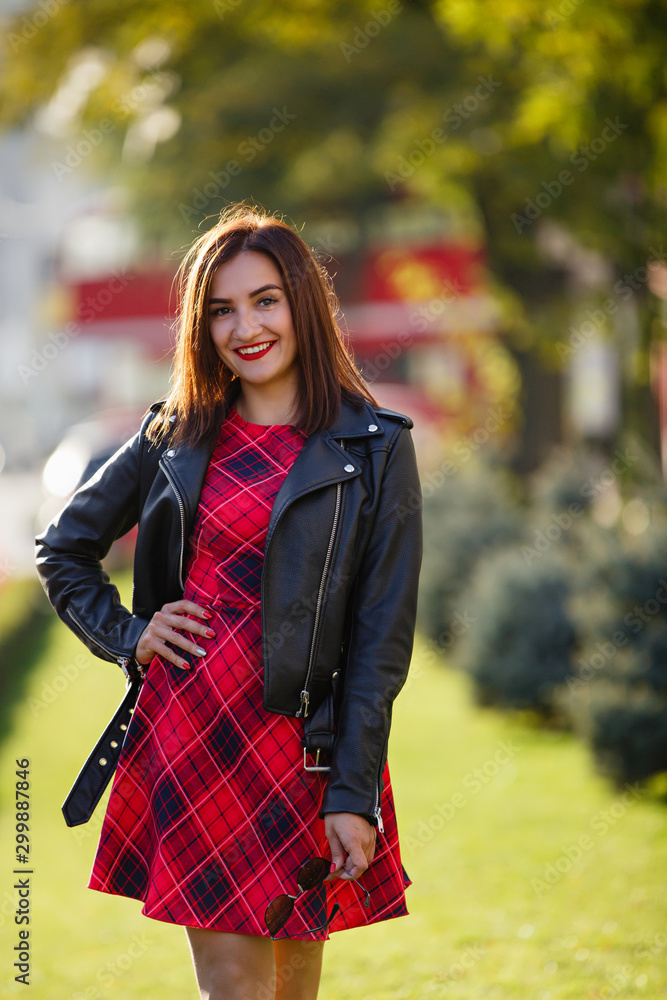 young woman near english bus. London red bus - girl enjoying life. Beautiful smiling female in London, England, United Kingdom. Woman jogging training in city with red double decker bus