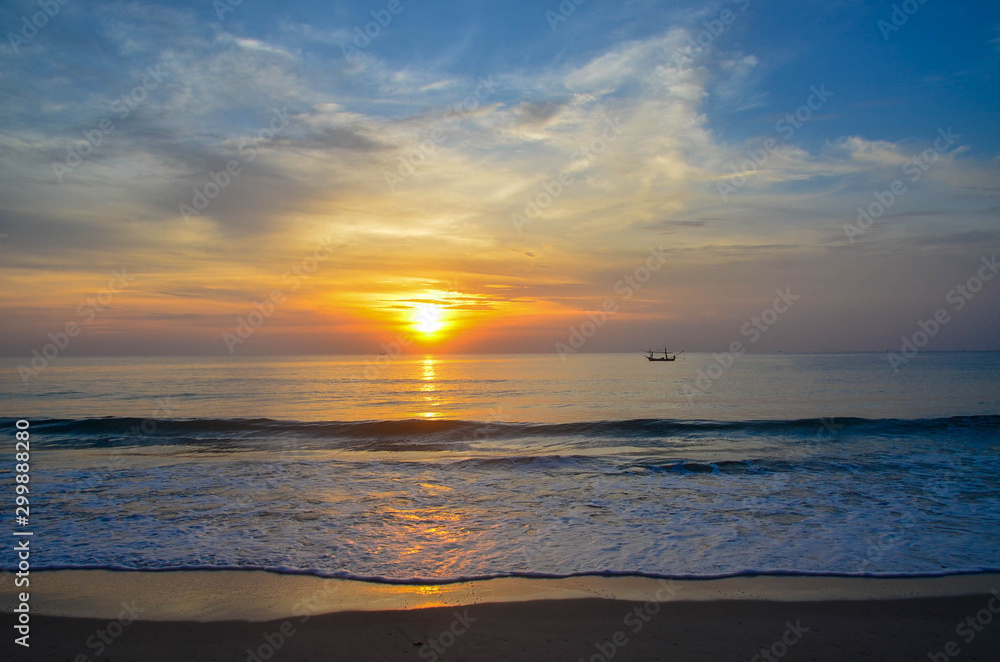 Tropical exotic sunrise seascape with ocean water reflection at Huay Yang beach resort, Thailand. Tropical exotic sunrise seascape with ocean water reflection at Huay Yang beach resort, Thailand.