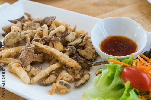 Deep fried mushroom with sweet and spicy sauce.