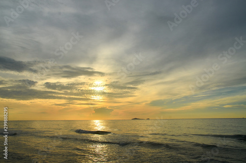 Tropical exotic sunrise seascape with ocean water reflection at Huay Yang beach resort  Thailand.