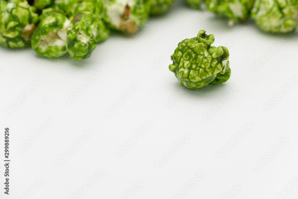 Lush of Japanese matcha green tea popcorn isolated on white background, Popular snack with favorite movie Lush of Japanese matcha green tea popcorn isolated on white background, Popular snack with favorite movie