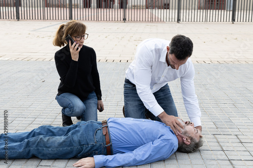 cpr phase of checking the airways, and correct placement of the head photo