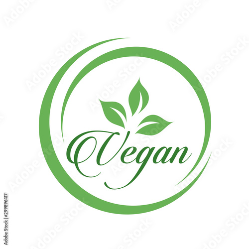 Vegan cursive text logo with green leaves for organic Vegetarian friendly diet- Universal vegetarian symbol photo