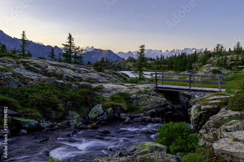 Lake Bianco at sunset, Mont Avic, Aosta province, Valle D'Aosta, Italy, Europe. photo