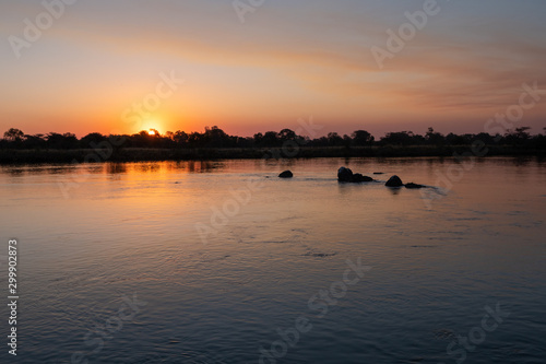 Romantic Sunset on the Okavango River, Caprivi Strip, Namibia, Africa - Beautiful, Serene, Lonely Landscape