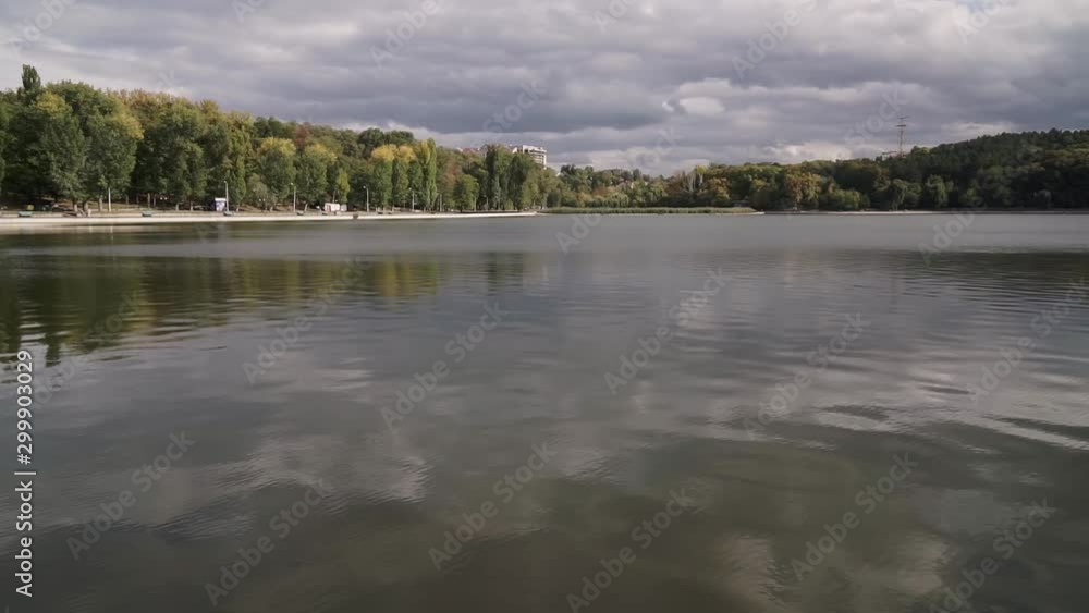 view of the city lake on a cloudy day view of the city lake on a cloudy day