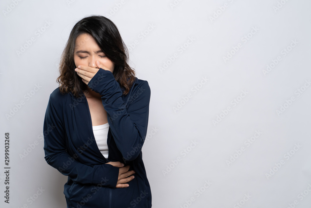 Woman has stomach ache isolated over white background Woman has stomach ache isolated over white background