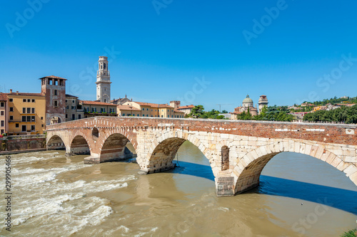 the old roman bridge Ponte di Pietra in Verona spans the river Etsch